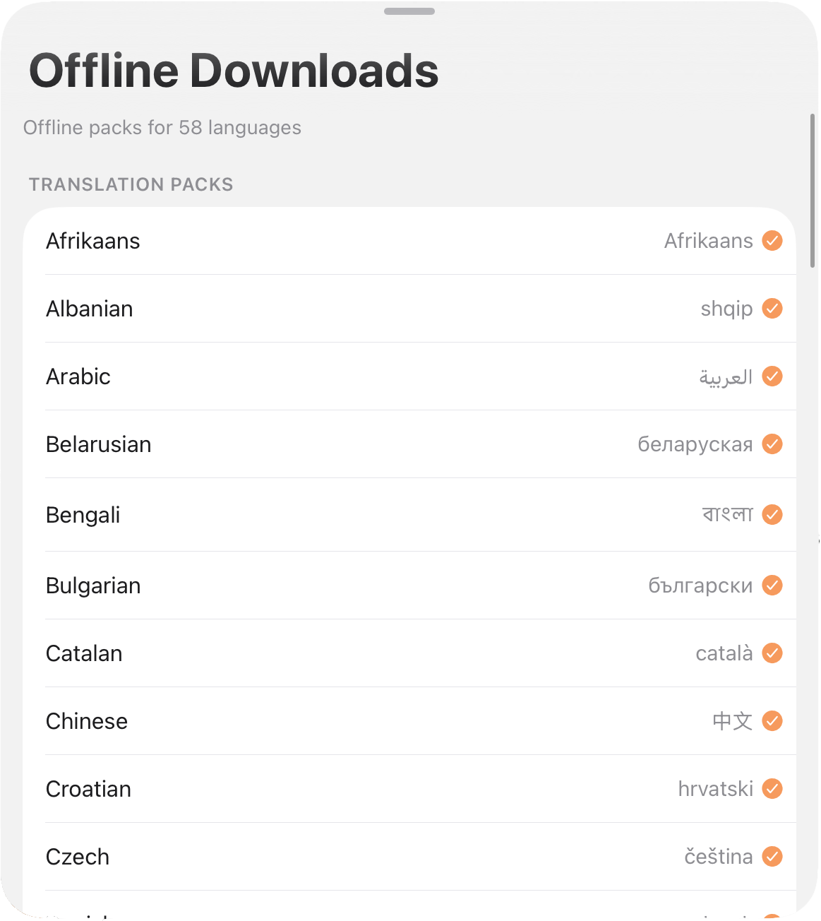 Offline Downloads screen showing translation packs for 58 languages available offline